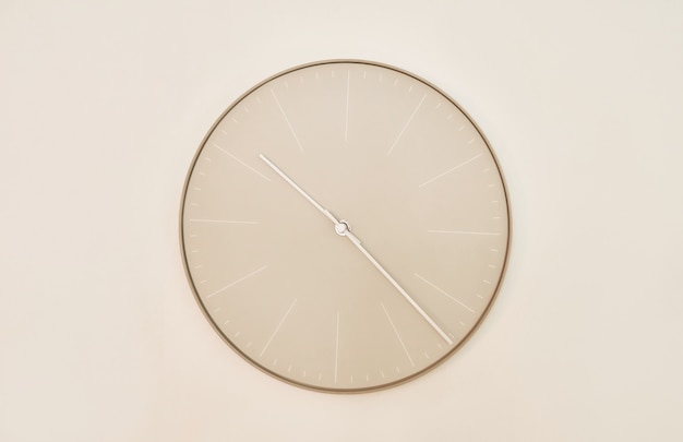 Modern wall clock. Clock in interior. Time concept. Working environment.