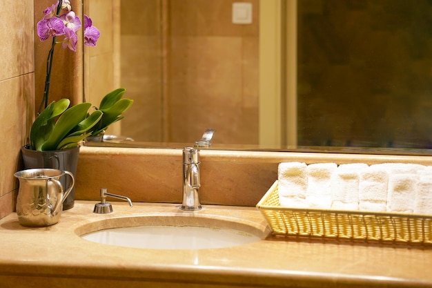 Modern white bathroom sink with faucet