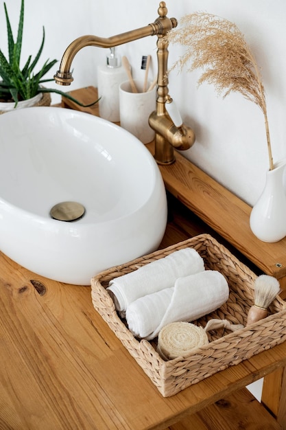 Modern white bathroom with washbasin and houseplant scandinavian style Bathroom in eco style