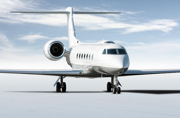 Modern white corporate business jet isolated on light background with sky