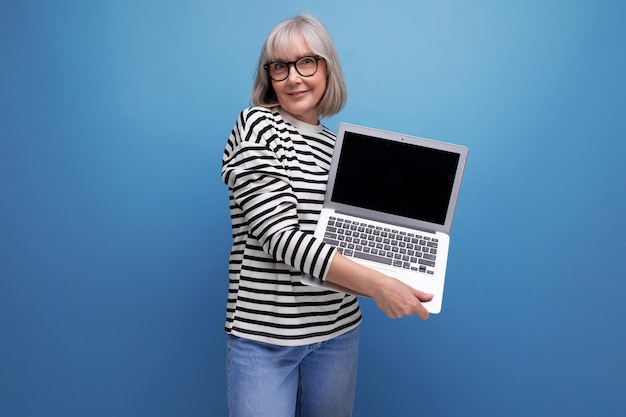 Modern woman s business holding pc with advertising mockup on bright studio background