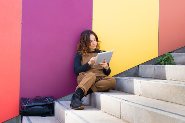 Modern woman tablet street