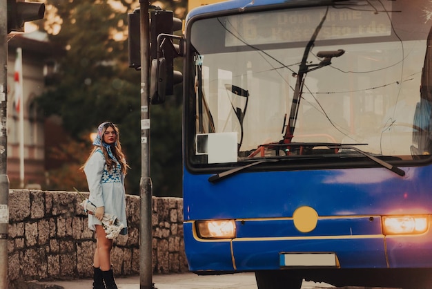 A modern woman walking the streets of the city dressed in modern clothes from the 19th century.