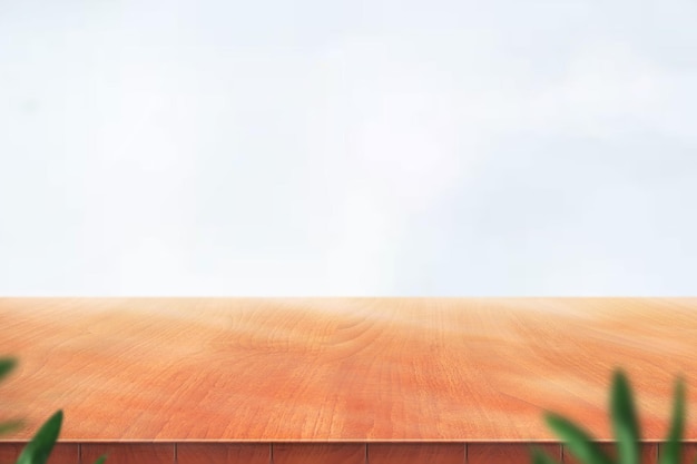 modern wooden tabletop with off white wall in the background - for product photography and mockups