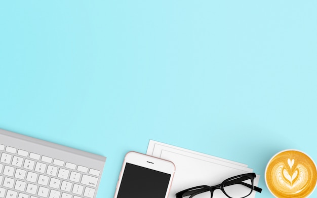 Modern workspace with coffee cup, keyboard and smartphone on Blue color