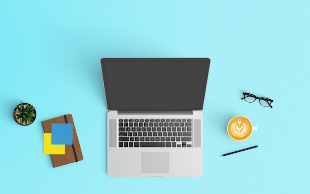 Modern workspace with coffee cup, notebook, blank paper and laptop on Blue color