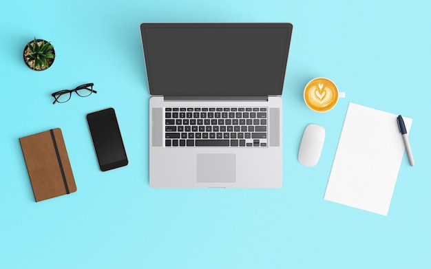 Modern workspace with coffee cup, smartphone, notebook and laptop on Blue color