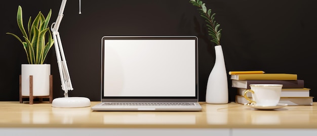 Modern workspace with notebook laptop mockup and decors on wood tabletop over black wall