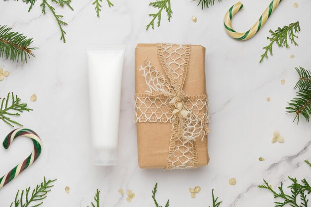 Moisturizer tube mockup and a Christmas gift