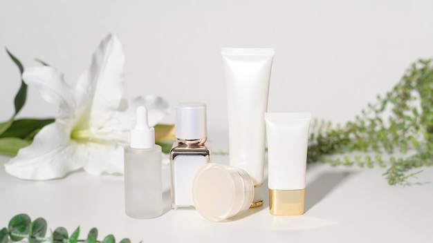 Moisturizing cream bottle over leaf background studio packing and skincare beauty concept