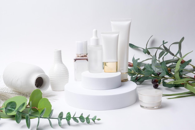 Moisturizing cream bottle over leaf background studio packing and skincare beauty conceptx9