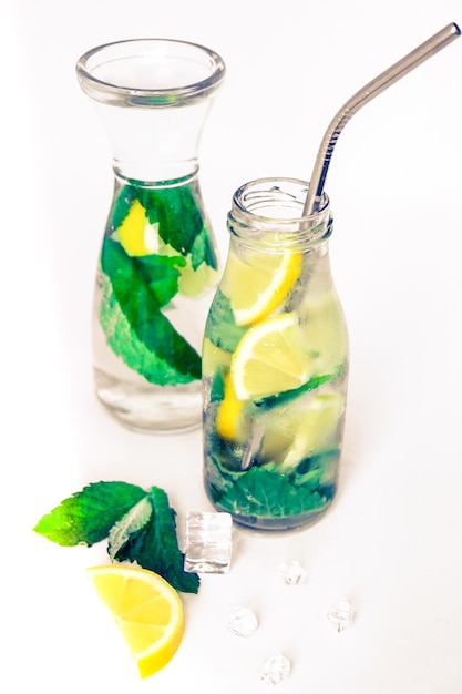 Mojito refreshing cocktail eco metal drinking straw alcohol drink Lemonade with lemon and mint leave