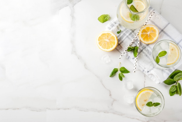 mojito with fresh mint, slices of lemon and ice top view