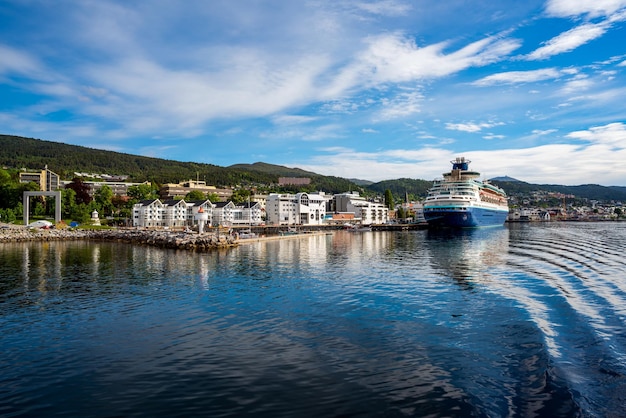 Molde in Romsdal, Norway. Molde has a maritime, temperate climate, with cool-to-warm summers, and relatively mild winters. The city is nicknamed The Town of Roses.