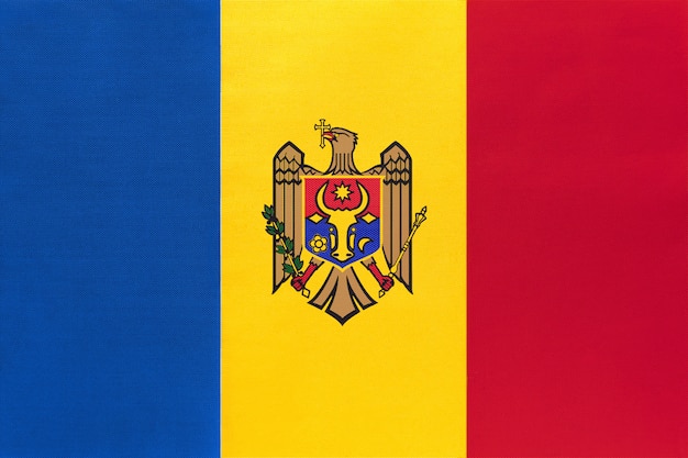 Photo moldova national fabric flag, symbol of international world european country.