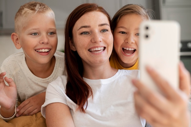 Mom doing a family videocall with her kids