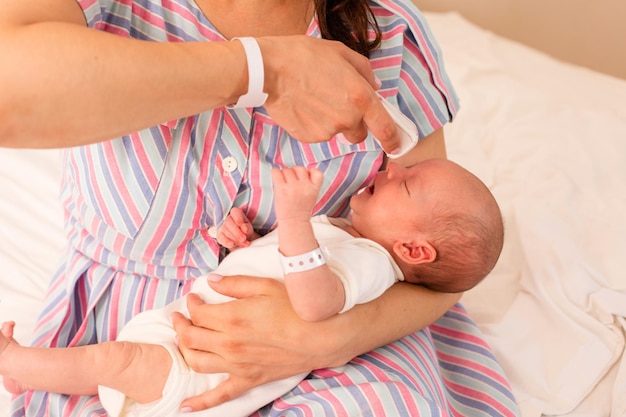 Mom and her newborn baby in a modern hospital