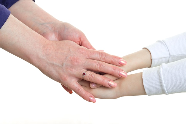 Mom keeps hands her child closeup isolated on white background