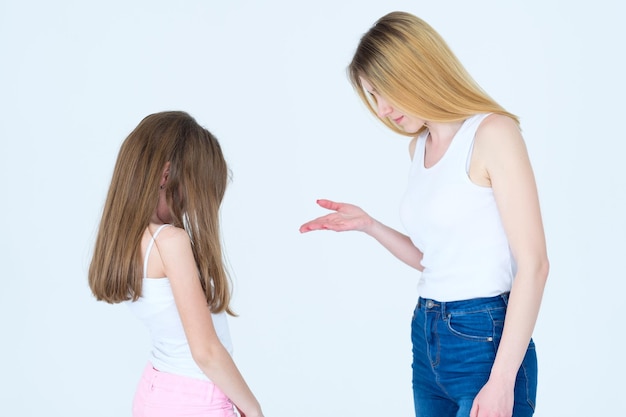 Mom scolding little daughter mother nagging or telling off her kid family relationship parenting and child raising