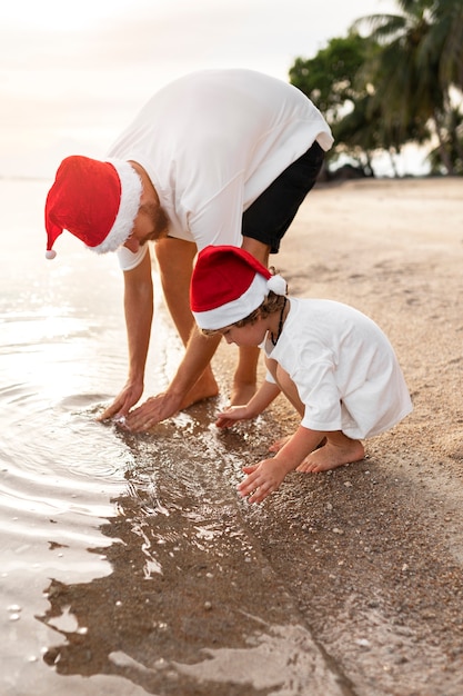 Mom and son celebrating christmas in july