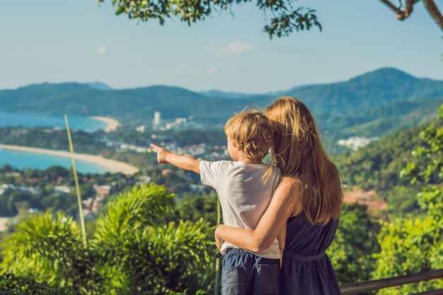 Mom and son on Karon View Point in sunny day. Phuket. Traveling with children concept.