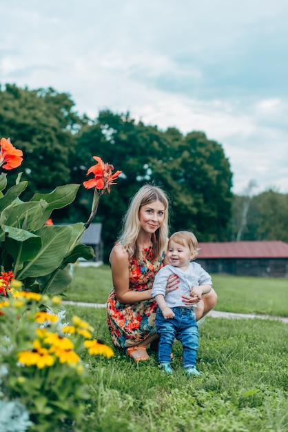 Mom and son watching flowers