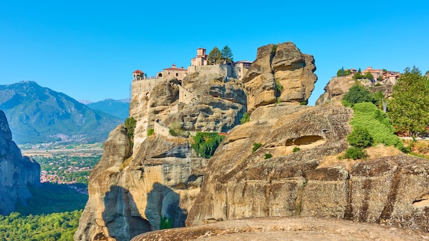 Monasteries of Varlaam and The Great Meteoron on the cliffs in Meteora, Kalambaka, Greece - Greek landscape