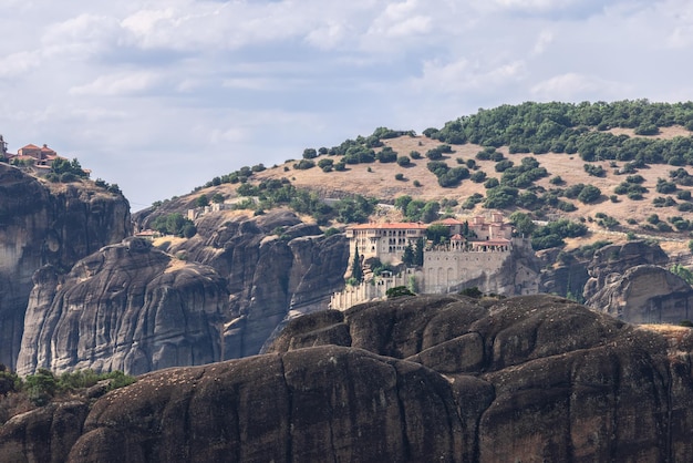 Monasteries of Varlaam and Great Meteoron on plateaus in visibility to each other in Meteora, Greece