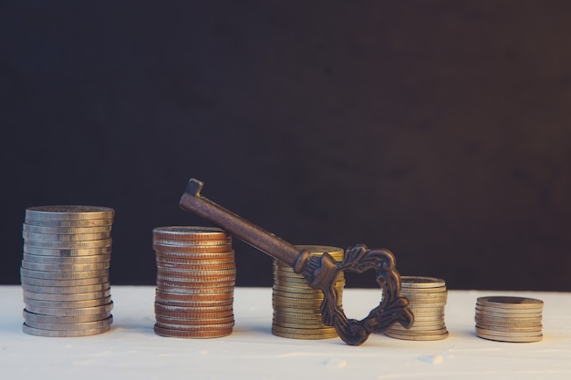 Money coin stack growing business on black background. concept