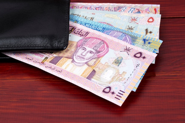 Money from Oman - Rial in the black wallet