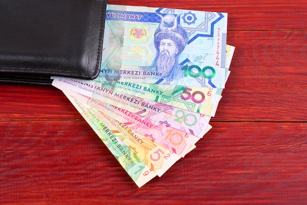 Money from Turkmenistan in the black wallet 