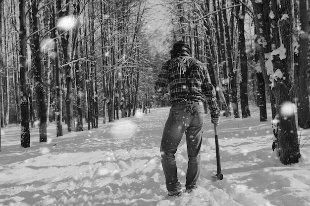 Monochrome landscape man with axe