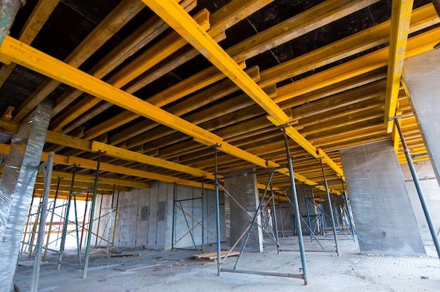 Monolithic construction Concrete walls with reinforcement of a new house under construction