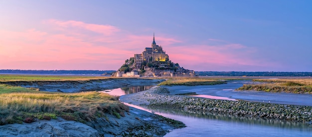 Mont Saint-Michel at sunset twilight in Normandy, northern France