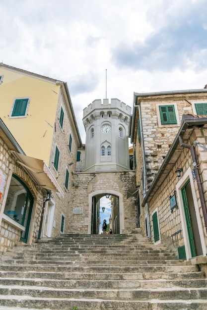 MONTENEGRO, HERCEG NOVI. tourists are walking along the narrow streets of the old city