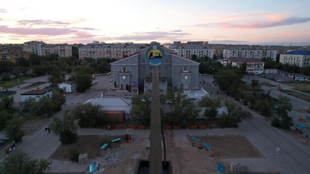 Monument to the city of balkhash at sunset