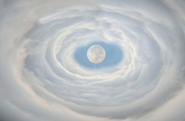 The moon is on end of cloud tunnel