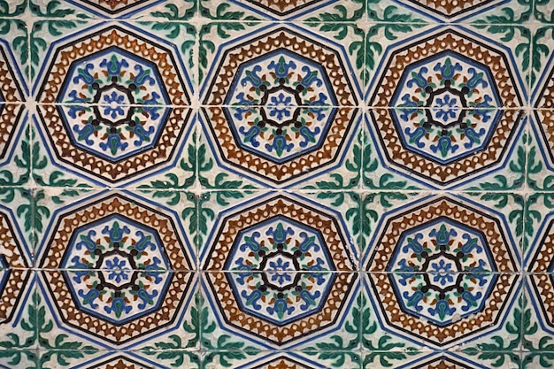 Moorish Ceramic Tiles in the walls of a Palace. Sevilla, Andalusia, Spain.