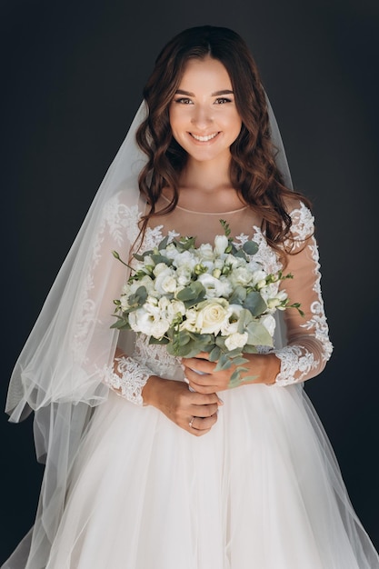 Morning of the bride. Preparing the bride for the upcoming wedding. Portrait of a girl.