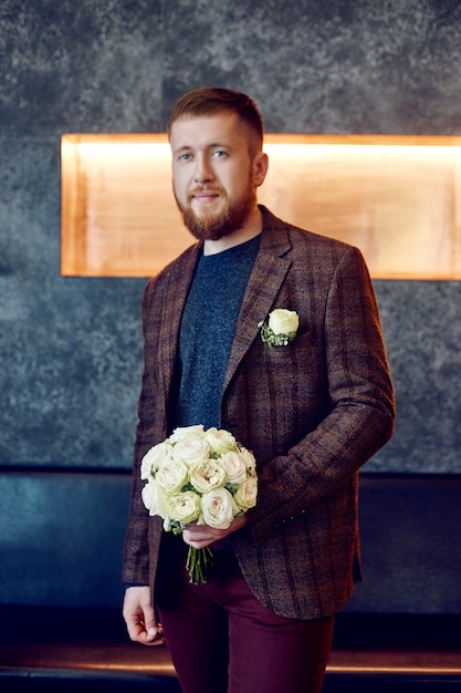 Photo morning bridegroom. a hipster man in a jacket