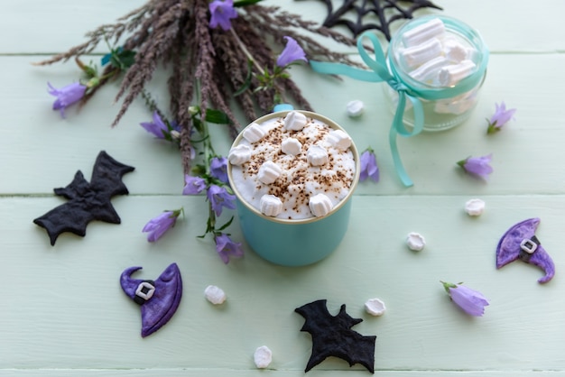 Morning holiday coffee for Halloween with marshmallows.