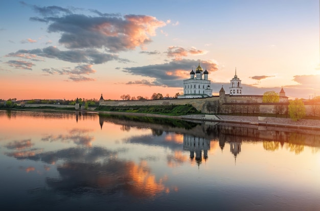 Morning landscape with of Pskov Kremlin and beautiful reflection of clouds in the river