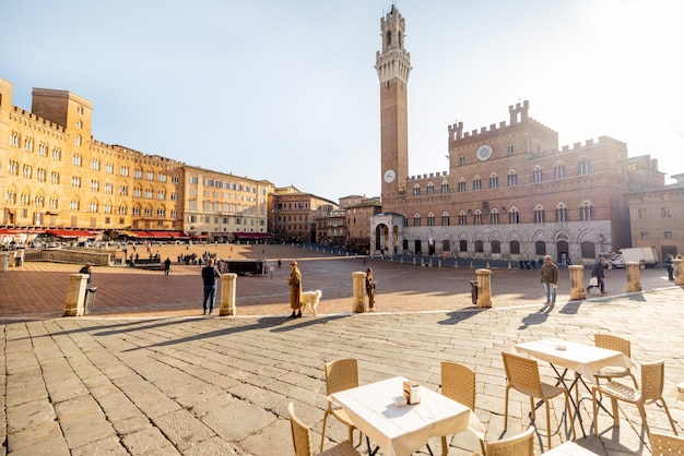 Morning view on the main square of siena city in italy