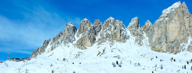 Morning winter Gardena Pass panorama with ski station Italy All people are unrecognizable