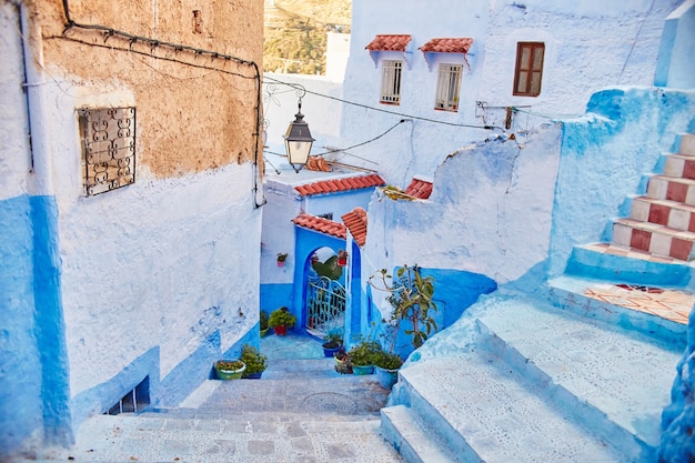 Morocco is the blue city of Chefchaouen, endless streets painted in blue color. Lots of flowers and Souvenirs in the beautiful streets of Chefchaouen. A magical fairy-tale city of heavenly color