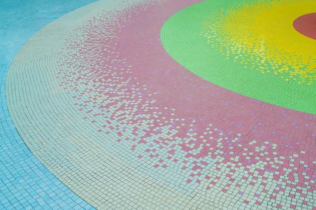 Mosaic on floor. Color transition in circle