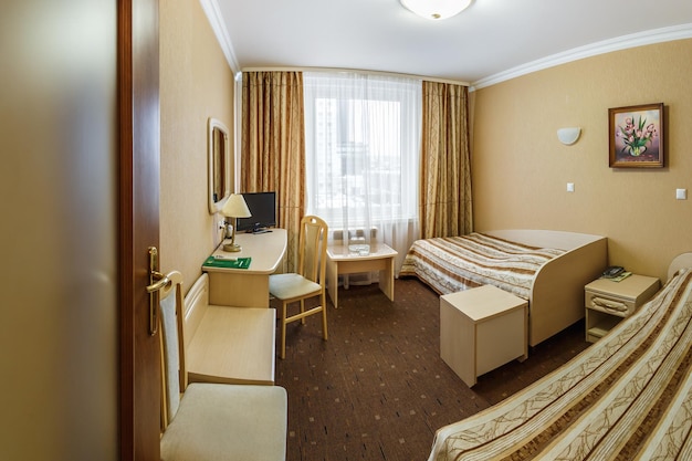 MOSCOW RUSSIA JANUARY 2017 panorama view in small bedroom room in hotel or hostel Wide angle view