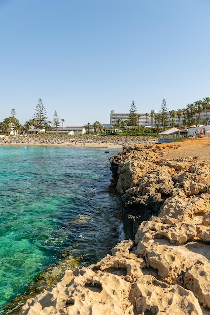 The most famous beach of Cyprus with crystal clear water. Nissi Beach.