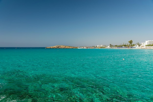 The most famous beach of Cyprus with crystal clear water Nissi Beach