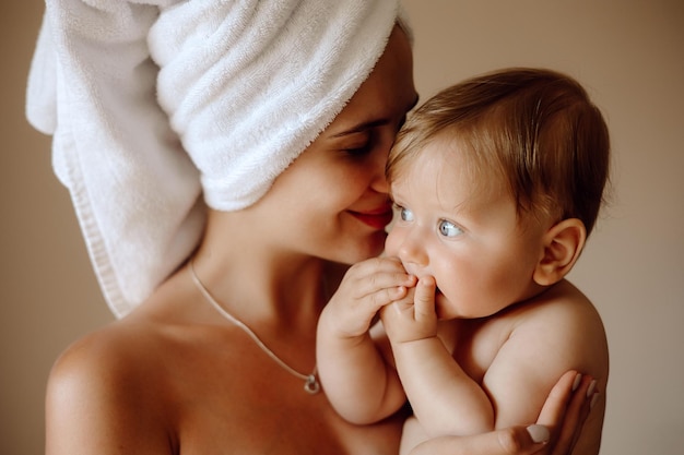 Mother and baby beautiful portrait mother and baby after bath mother and baby happy after shower